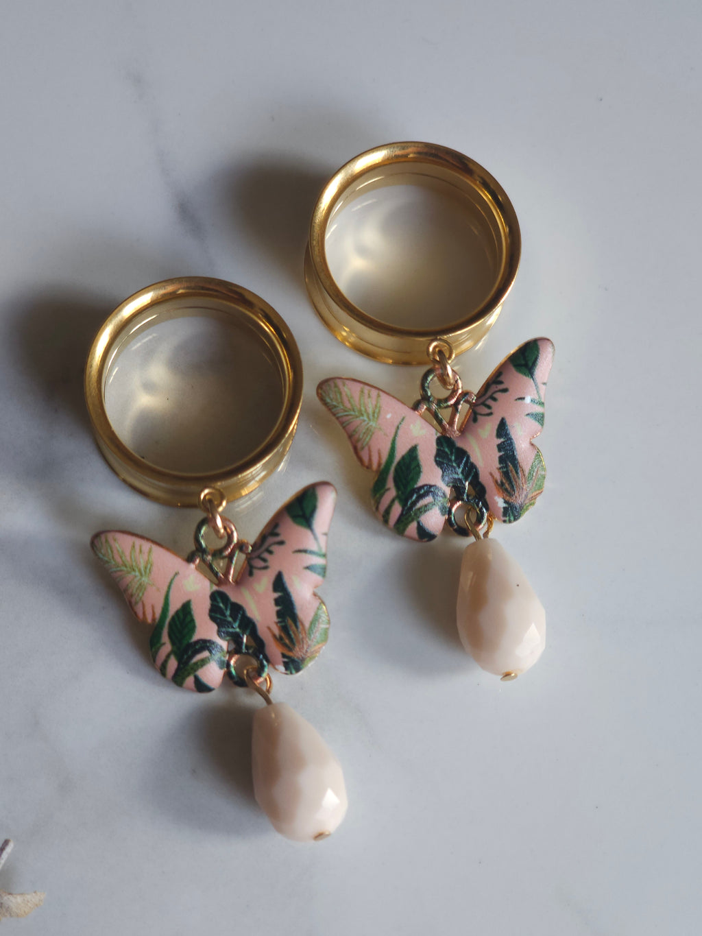 Pink butterfly dangle gauges