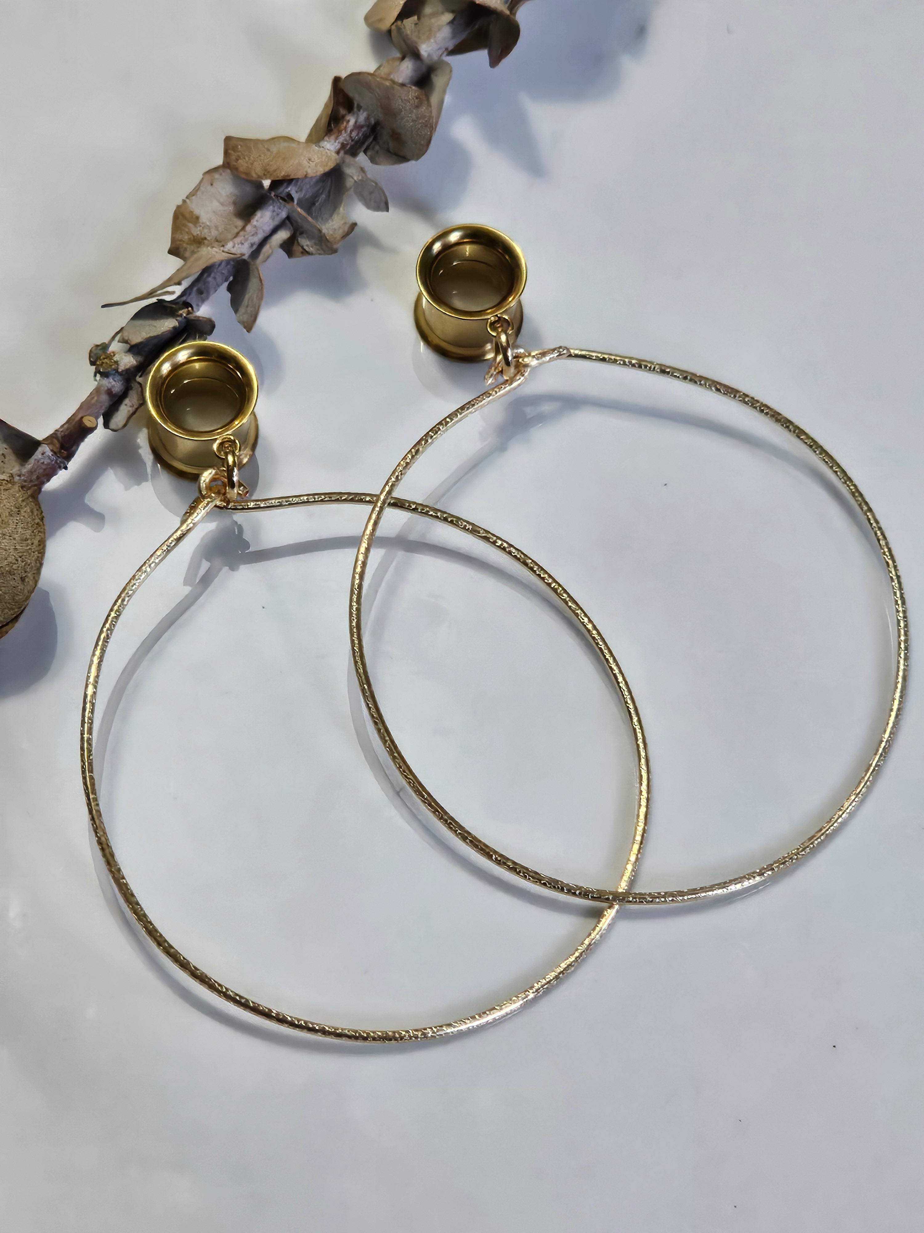 Large hoop dangle gauges
