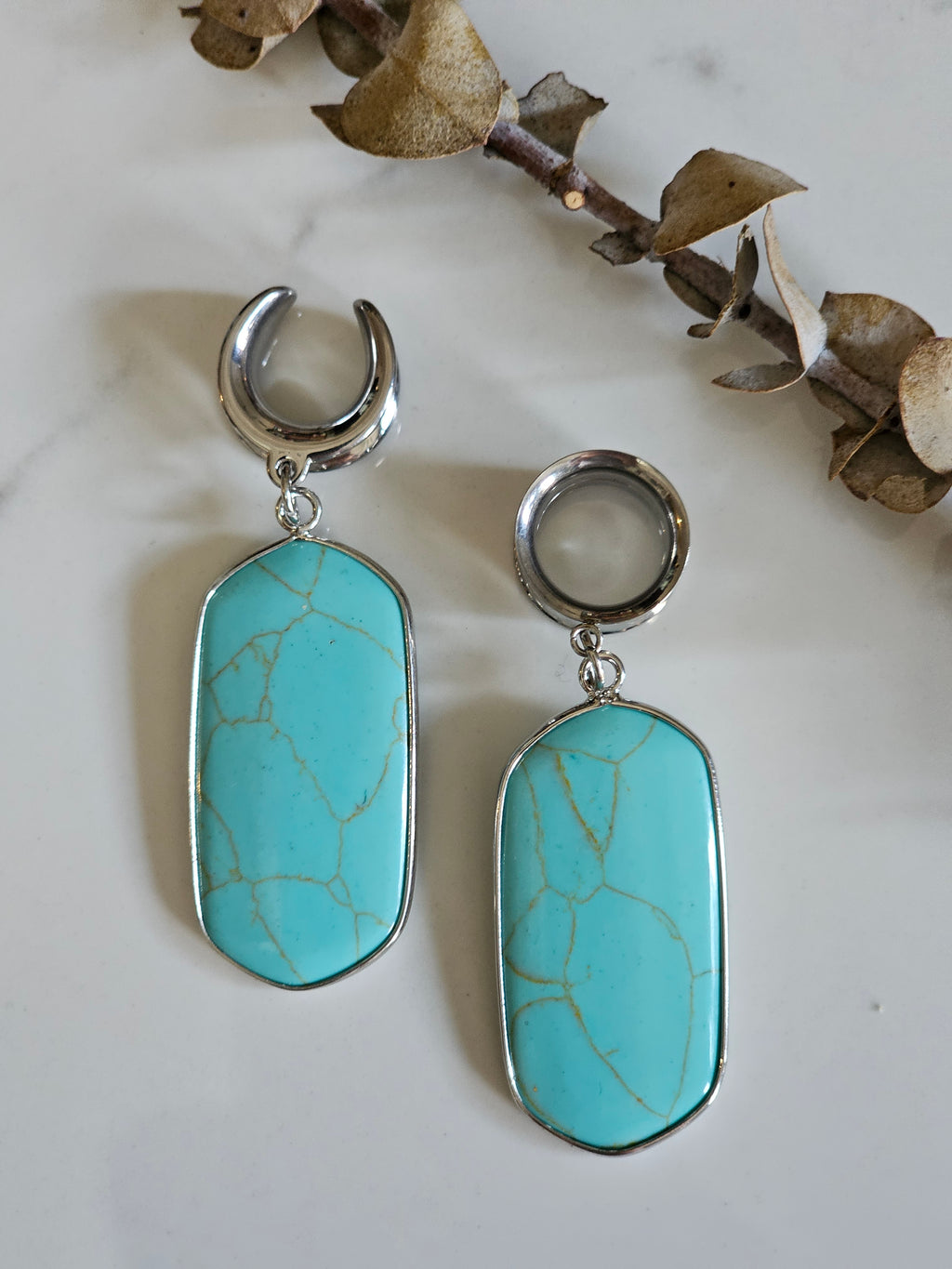 Turquoise saddle gauges