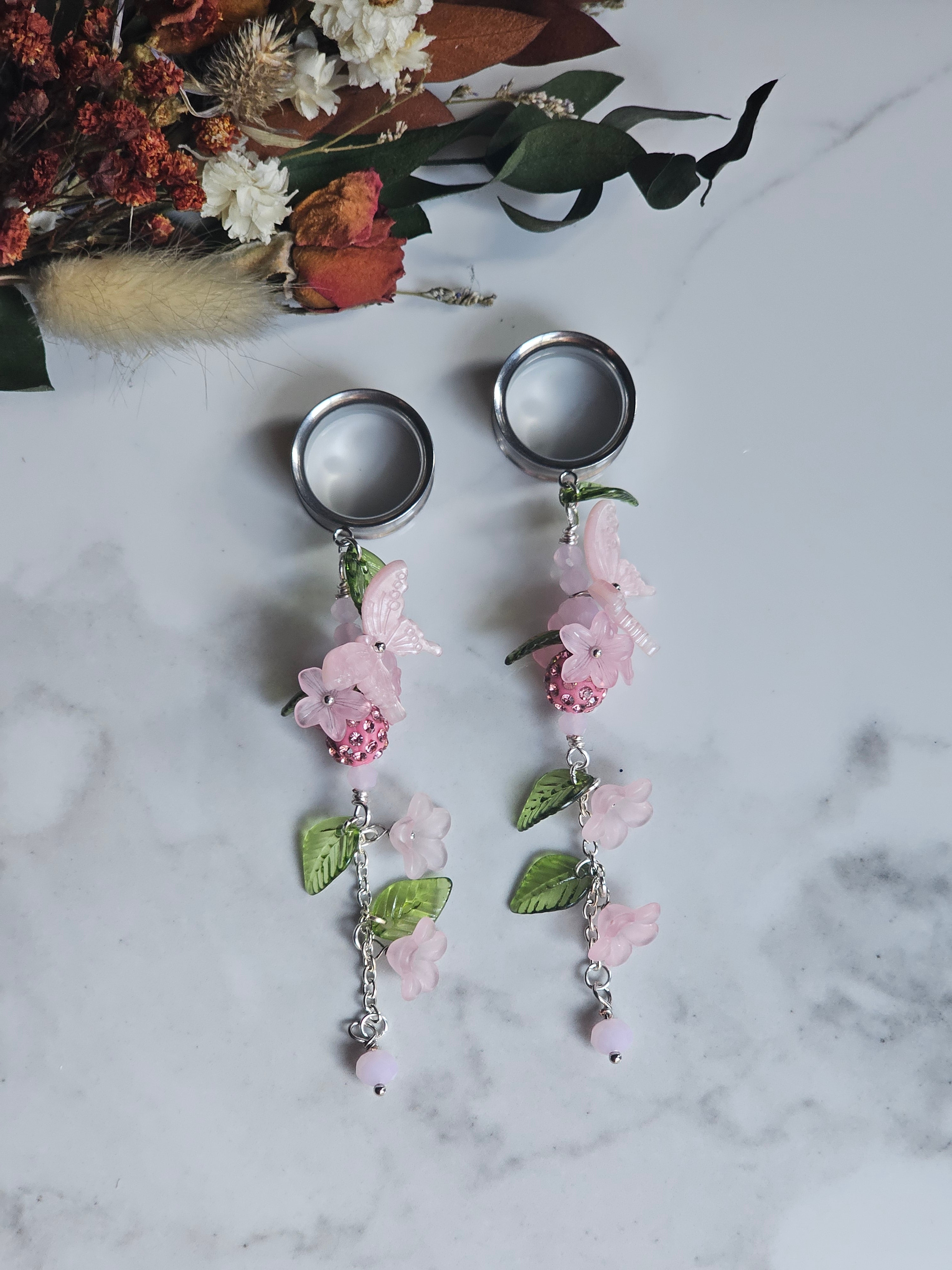 Pink floral dangle gauges