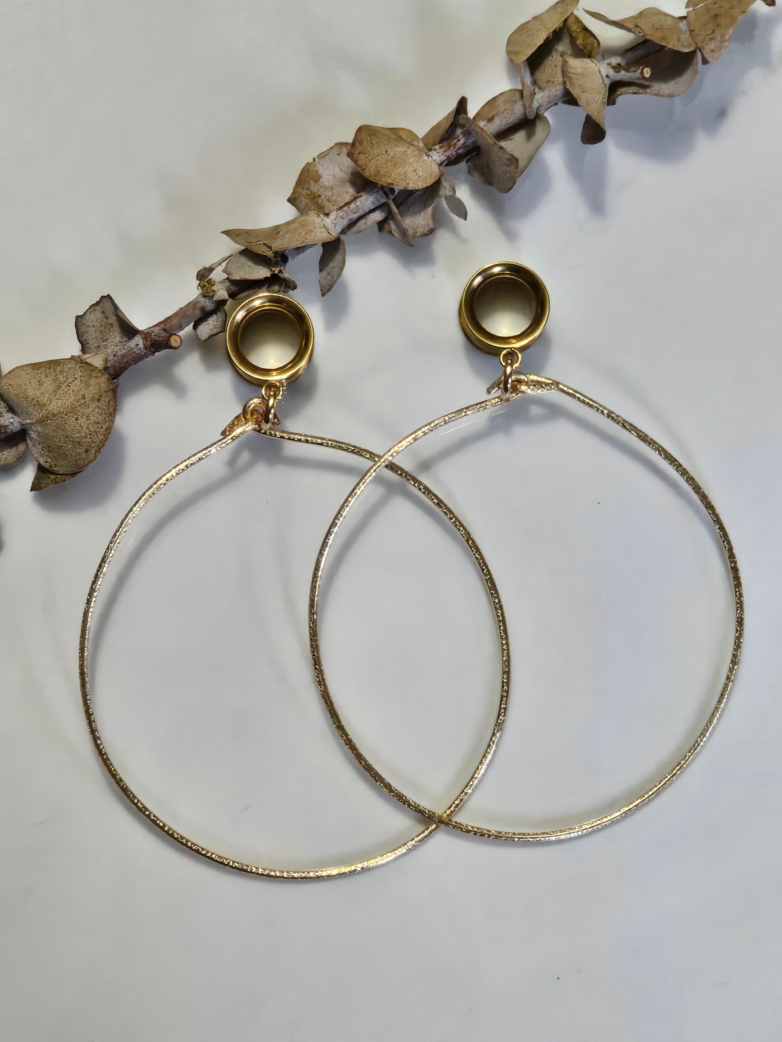 Large hoop dangle gauges