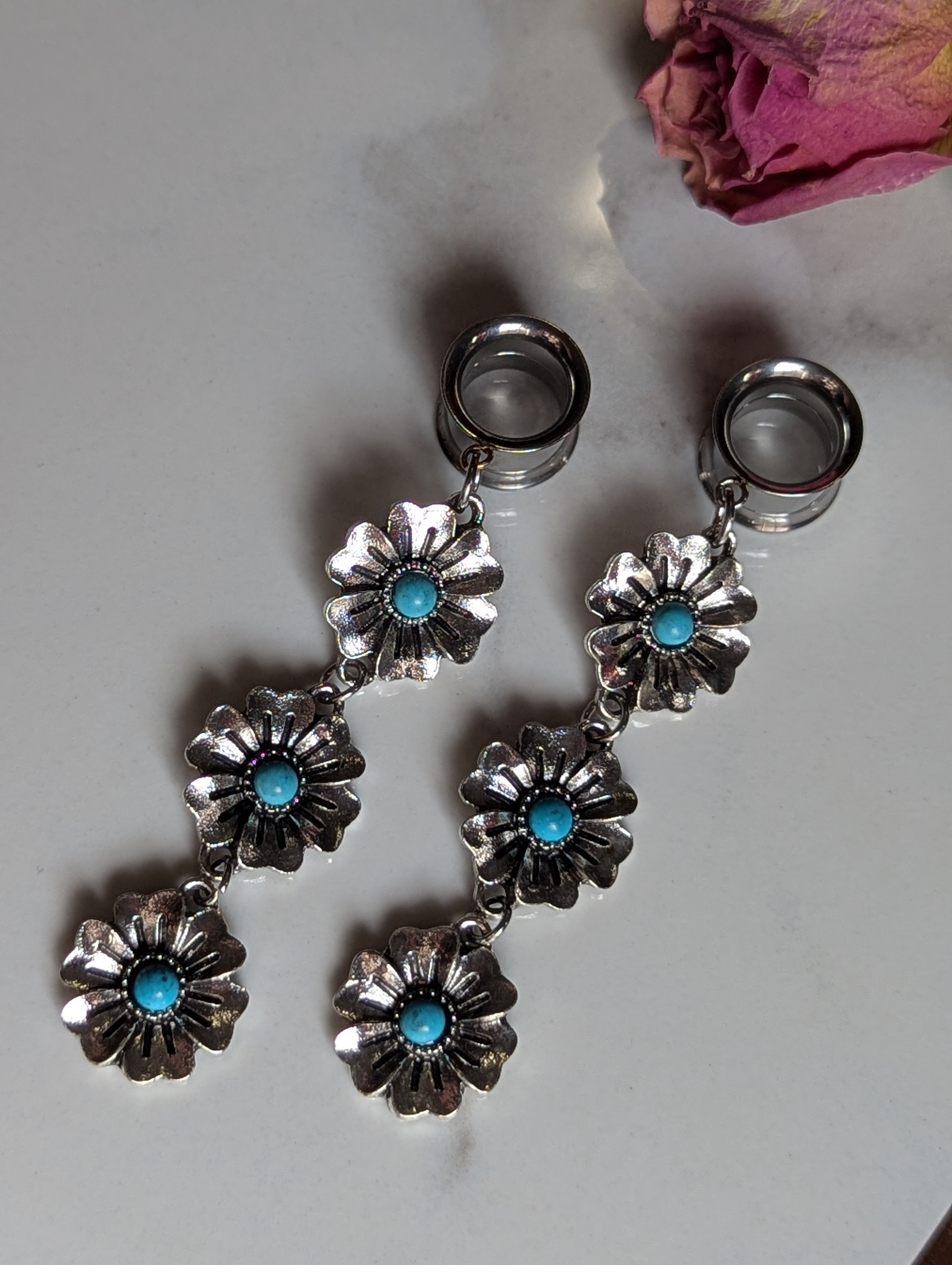 Turquoise flower dangle gauges
