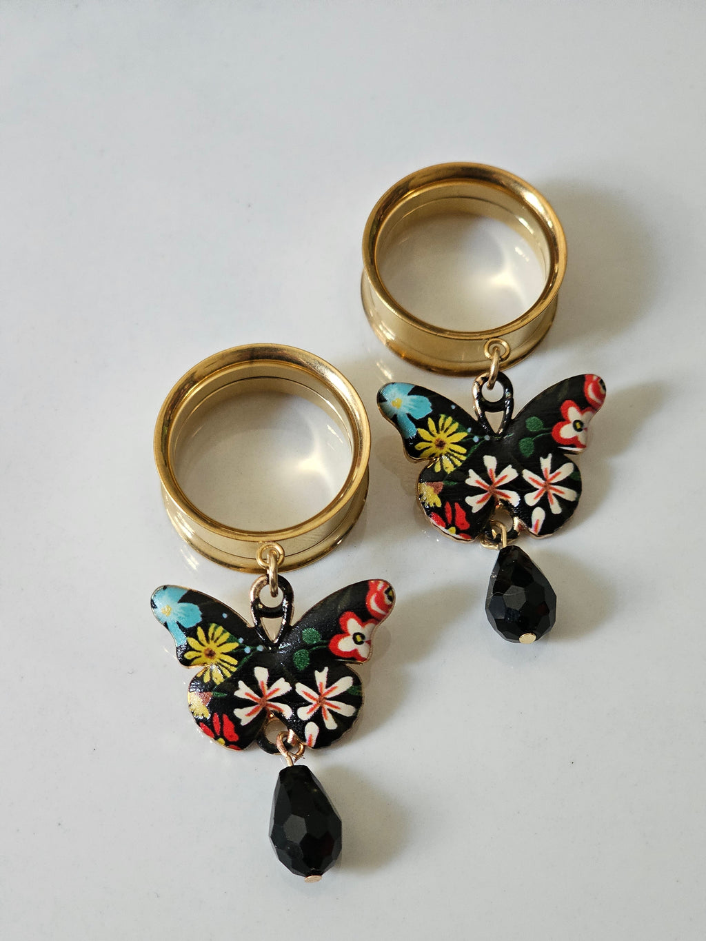 Black butterfly dangle gauges
