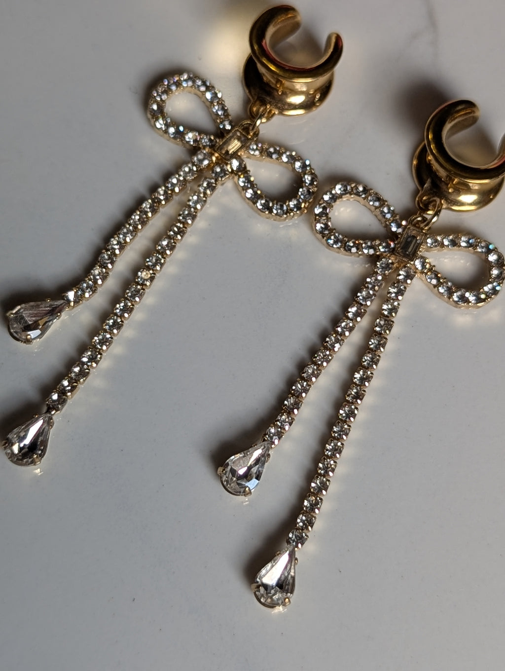 Diamond bow saddle gauges