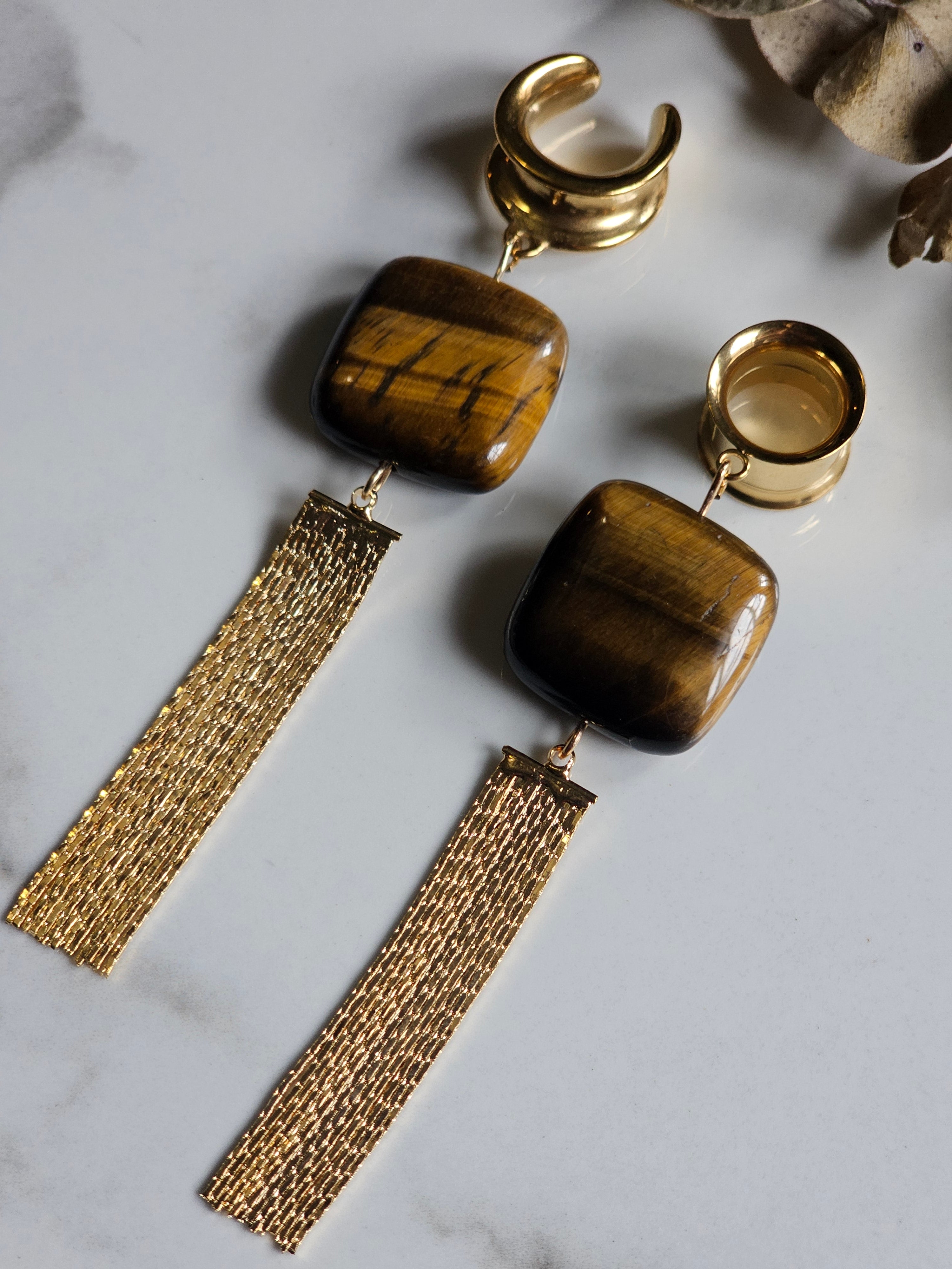 Tiger eye dangle gauges