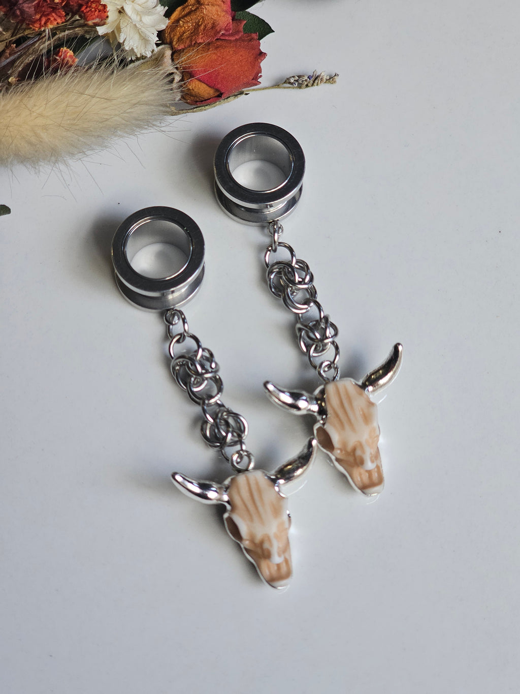 Bull skull dangle gauges