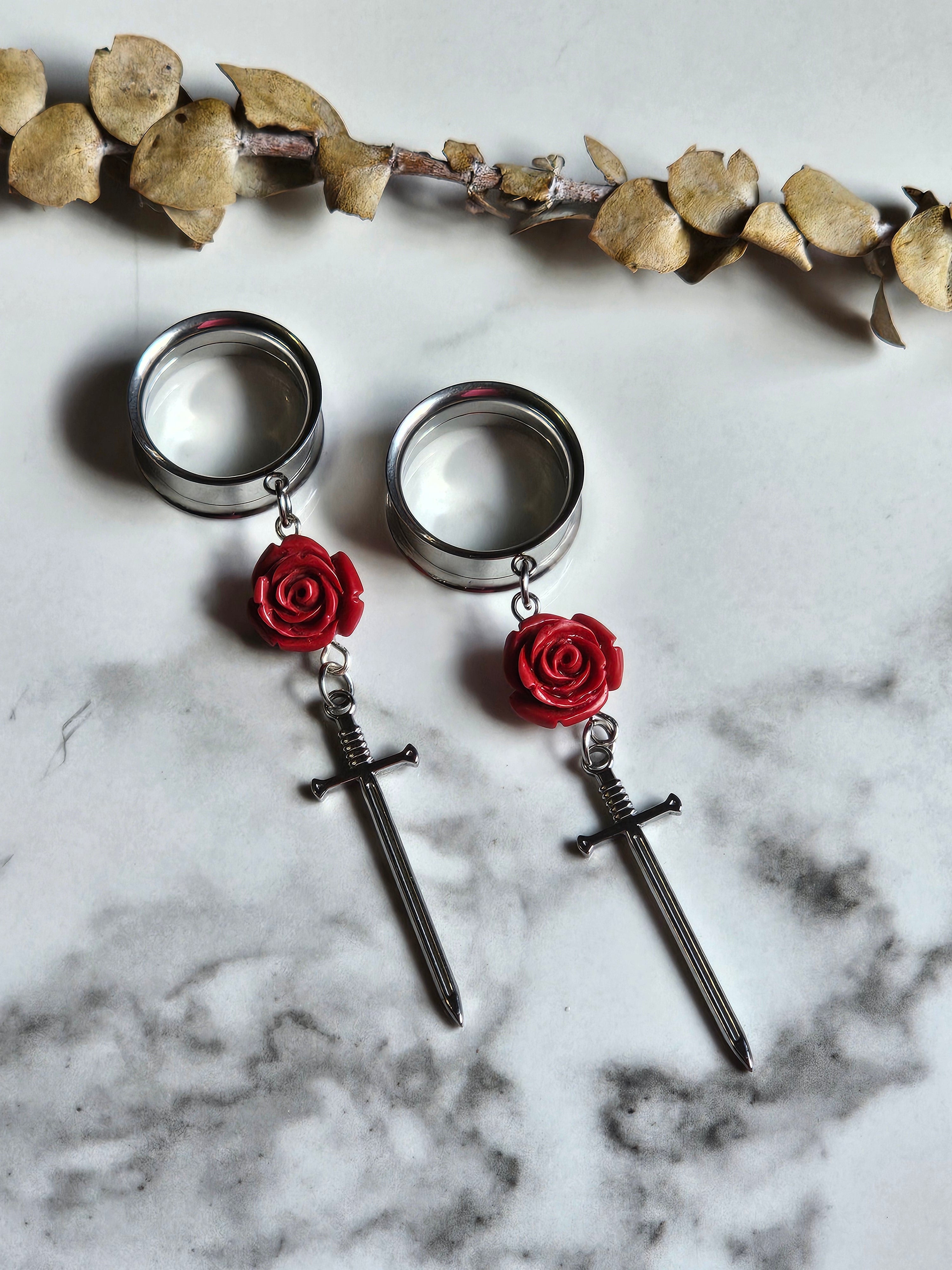 Rose sword dangle gauges