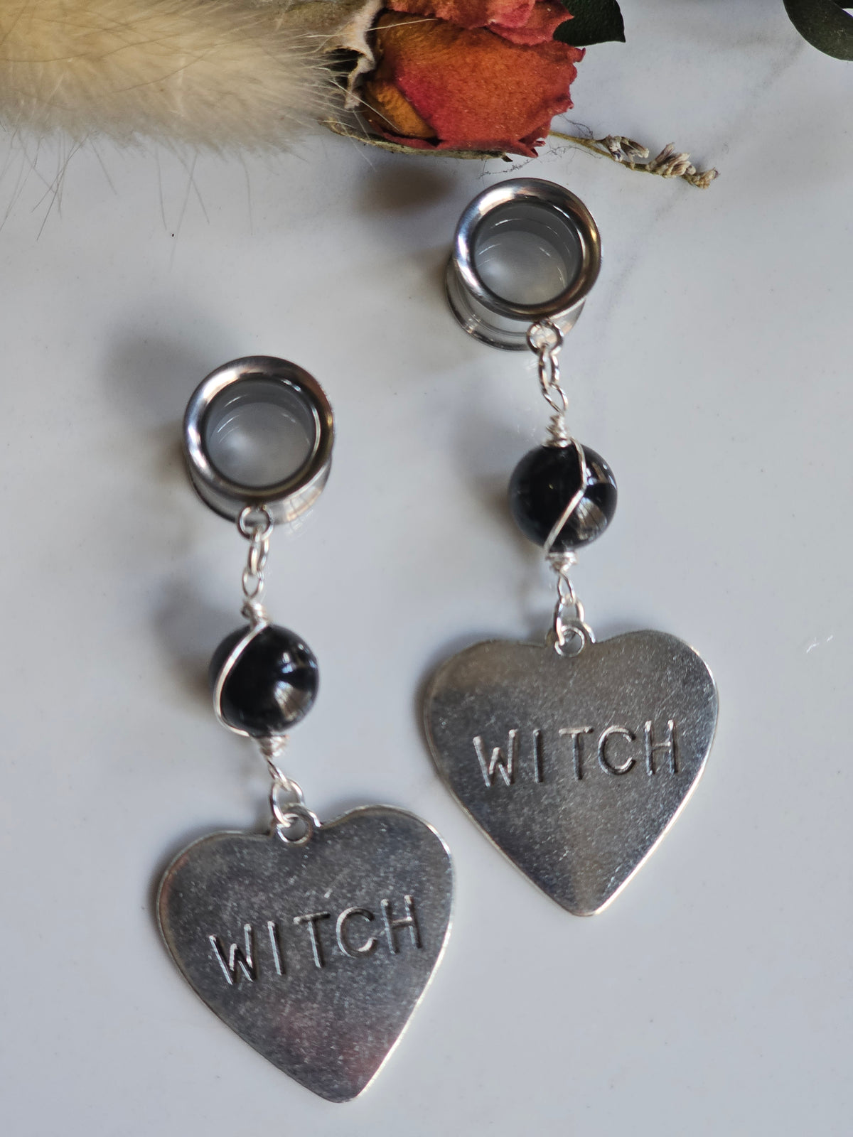 Witch dangle plugs