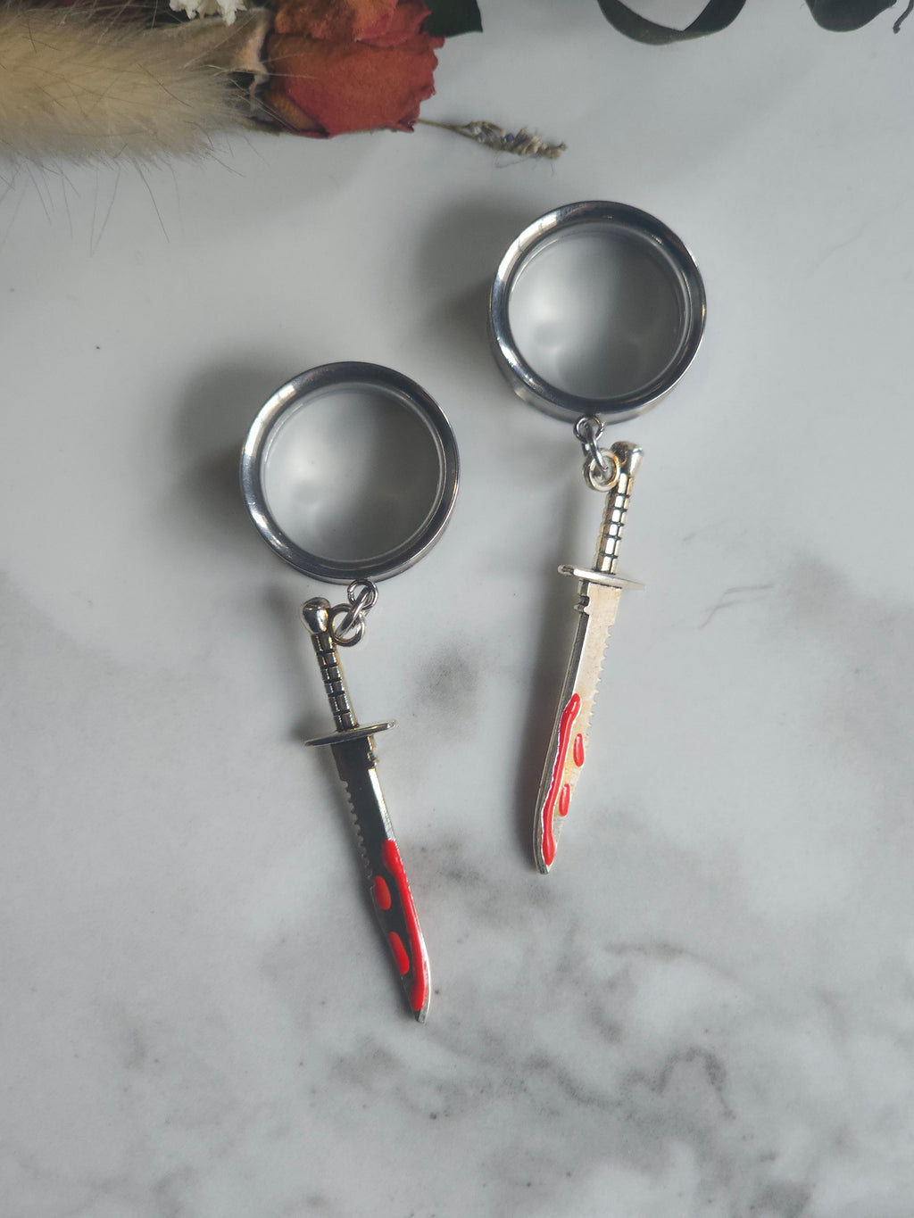Bloody butcher knife dangle gauges