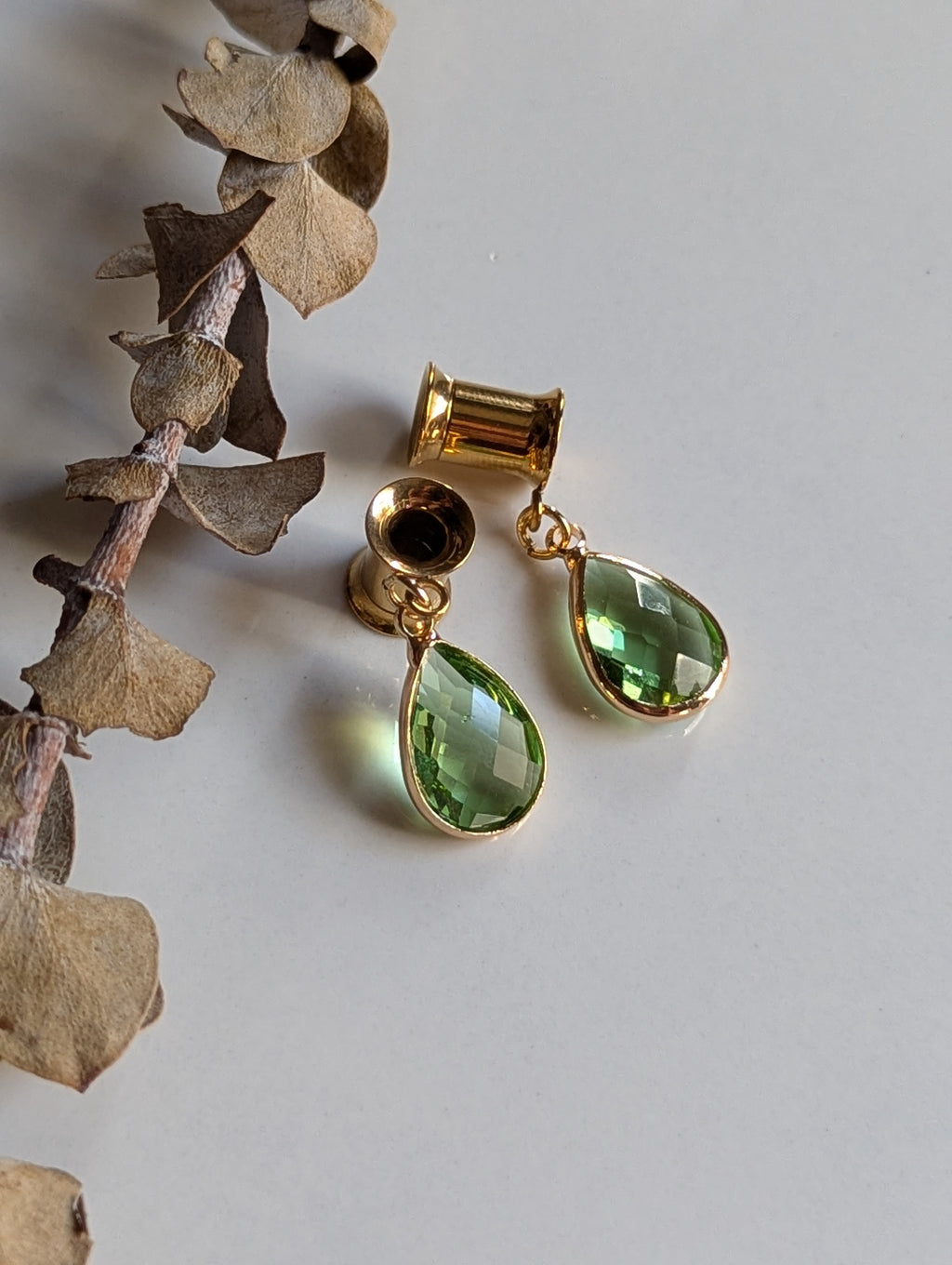 Peridot dangle gauges