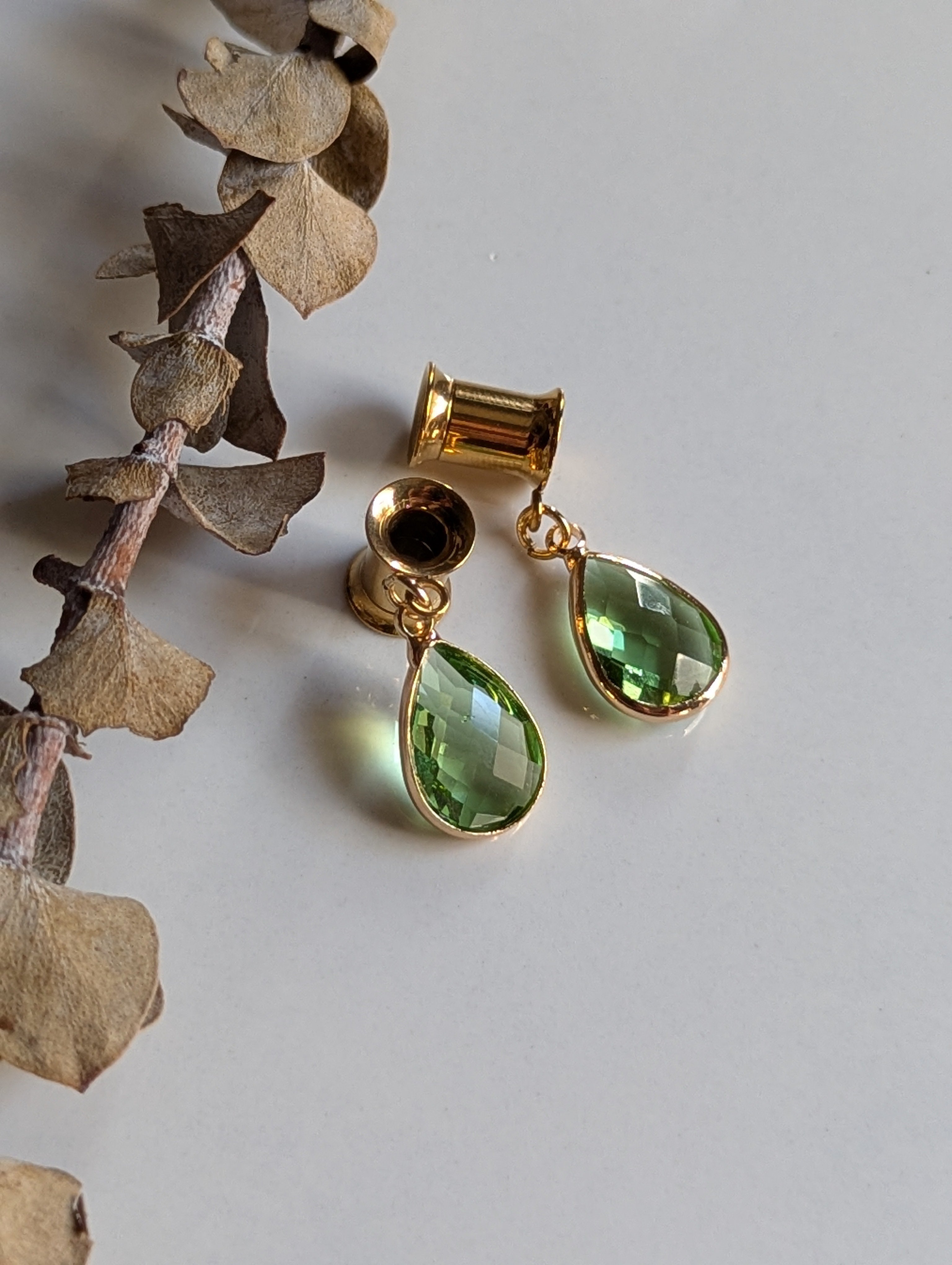 Peridot dangle gauges