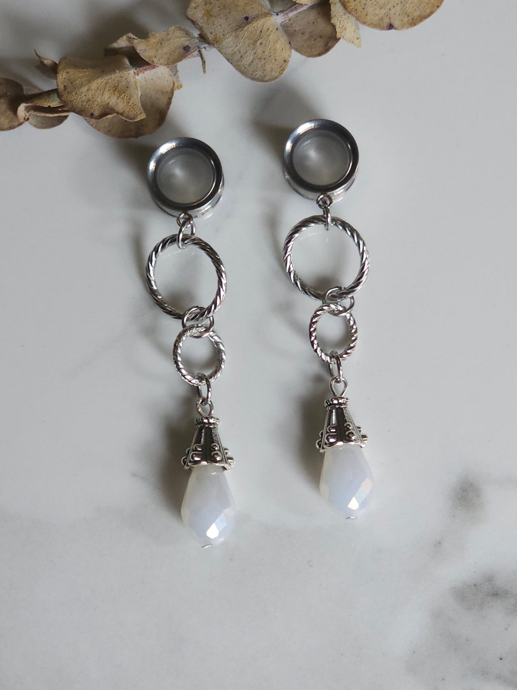 White drop dangle gauges
