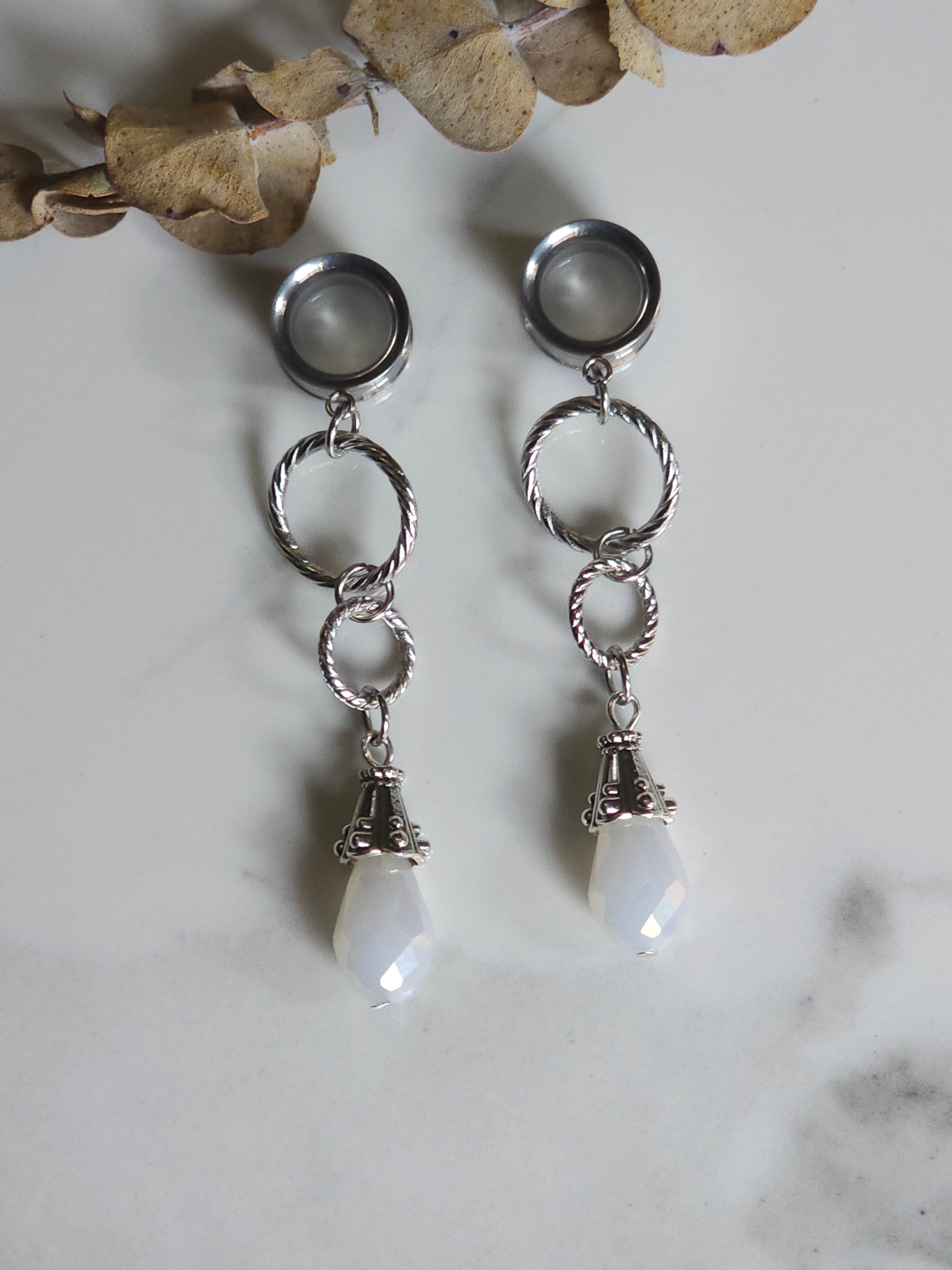 White drop dangle gauges