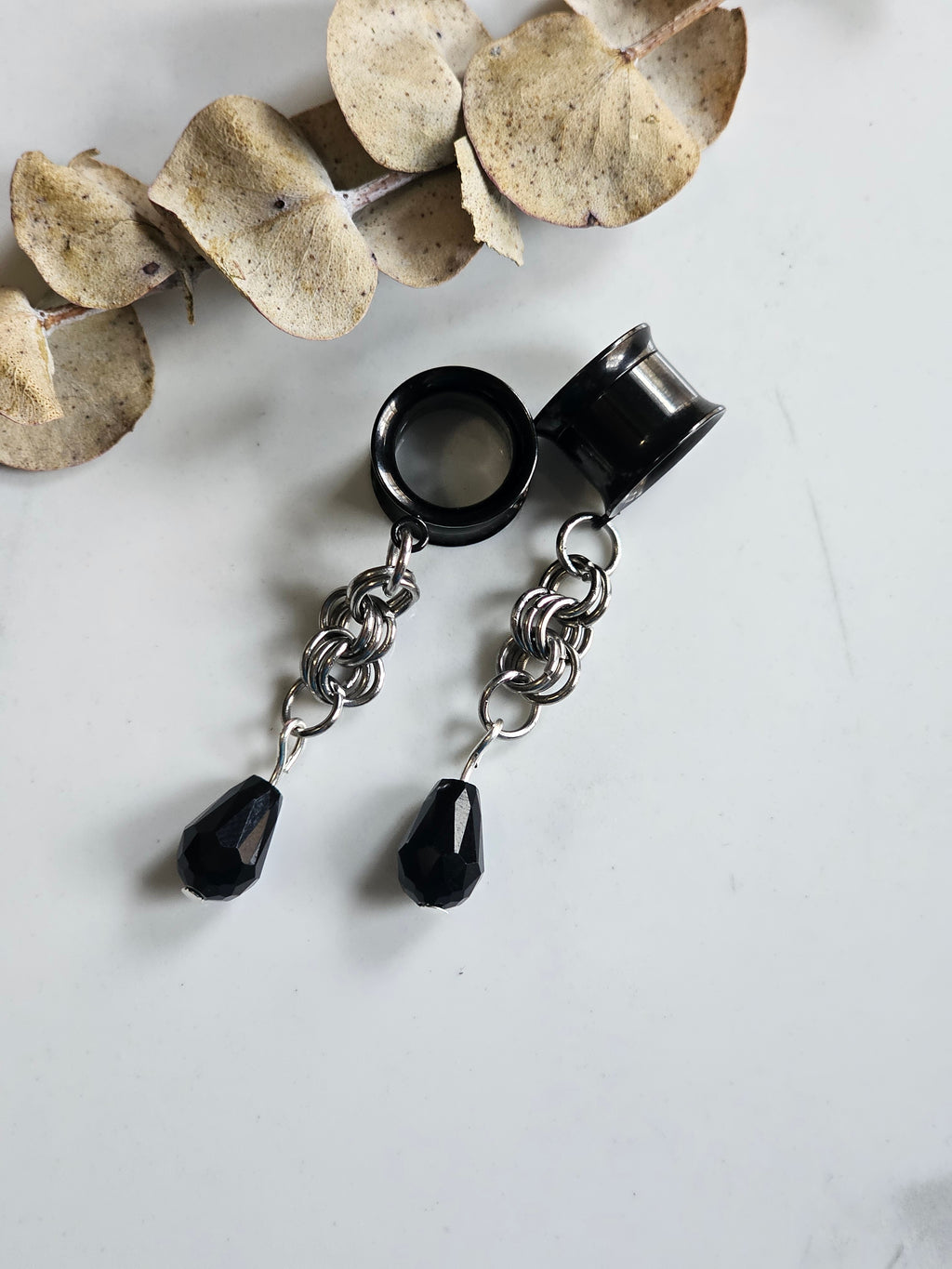 Black drop dangle gauges