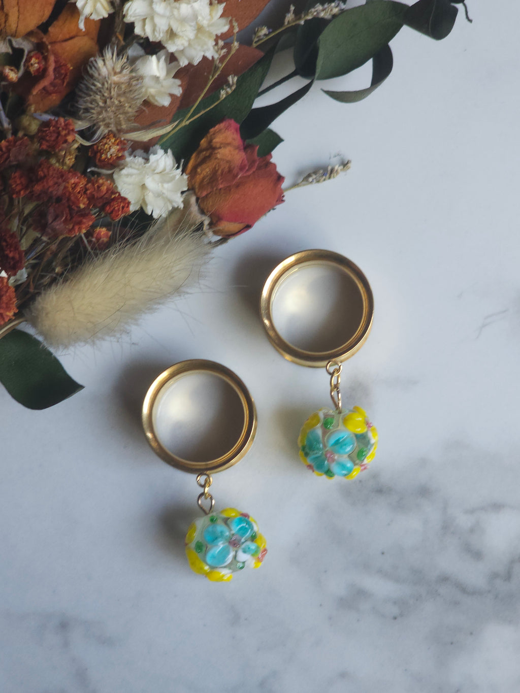 Floral lampwork dangle plugs