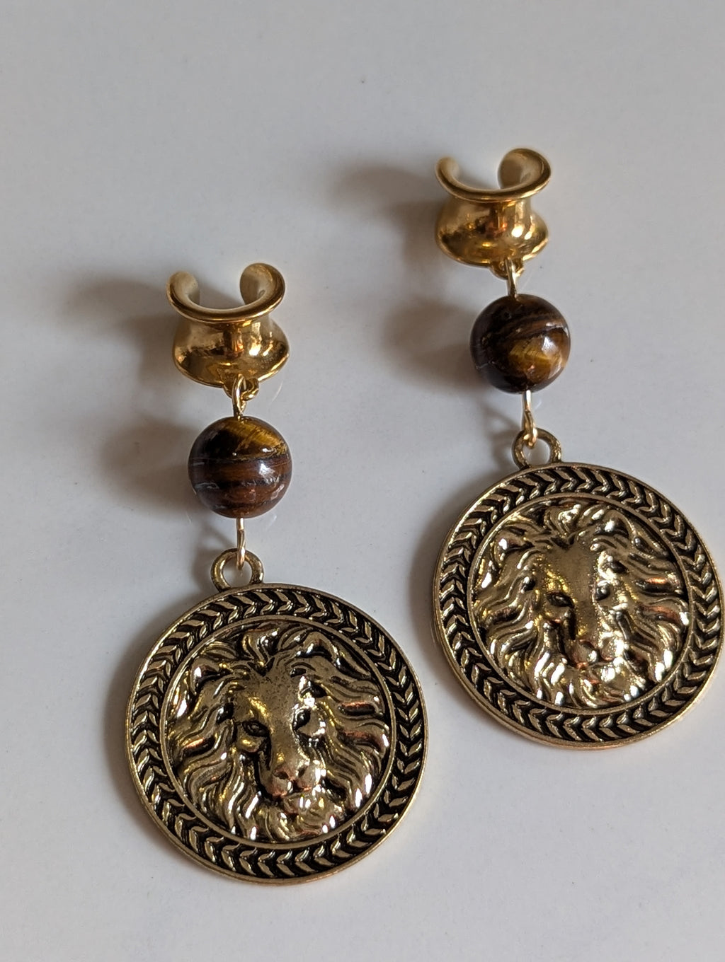 Lion Medallion saddle gauges