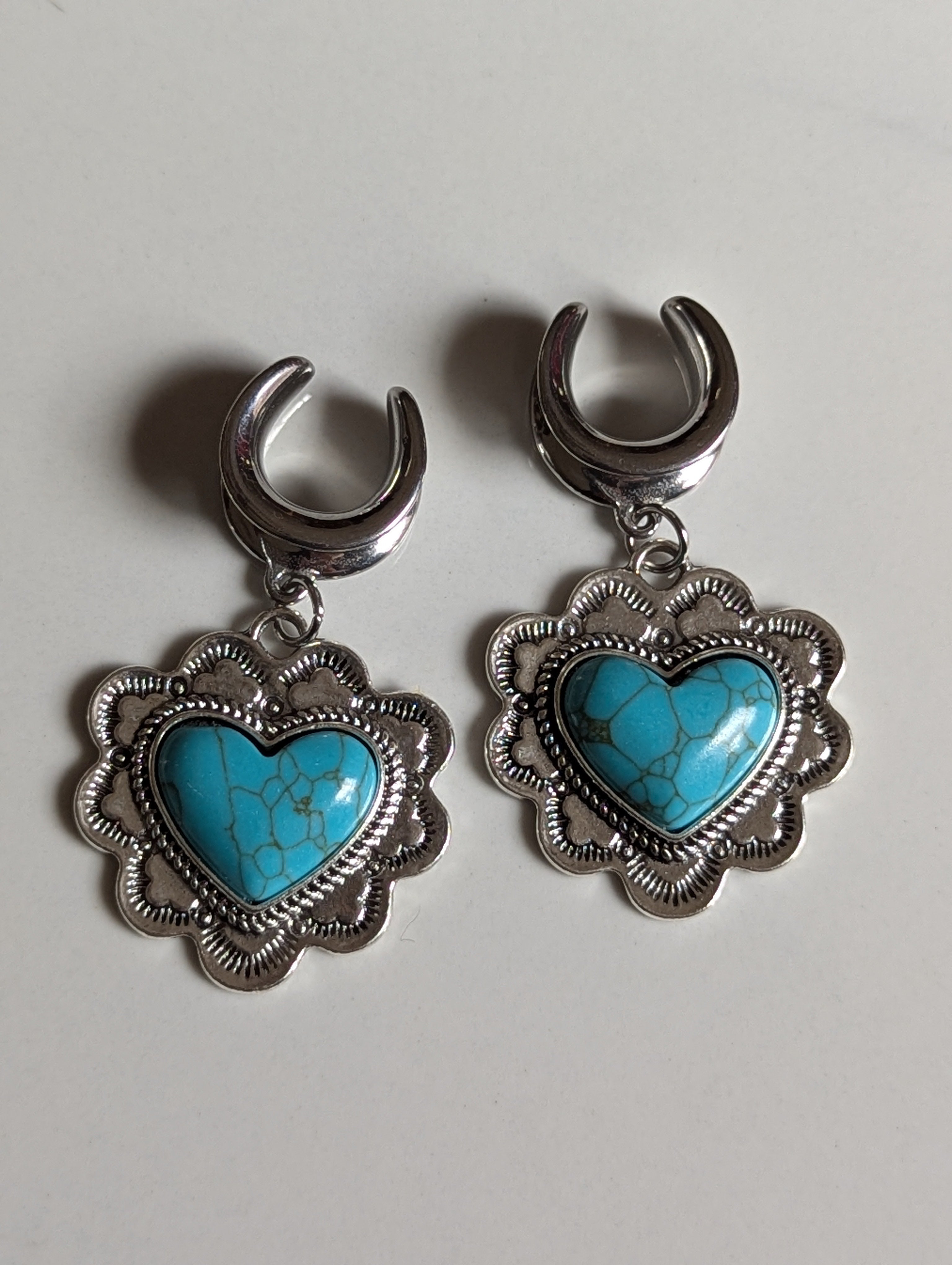 Turquoise heart saddle gauges